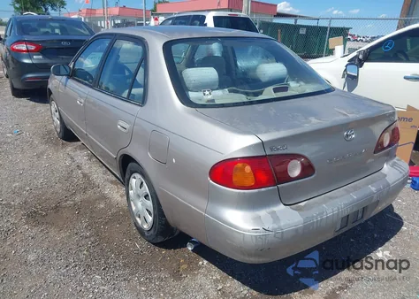 2001 Toyota Corolla Le from USA, damaged, VIN 1NXBR12E81Z501382